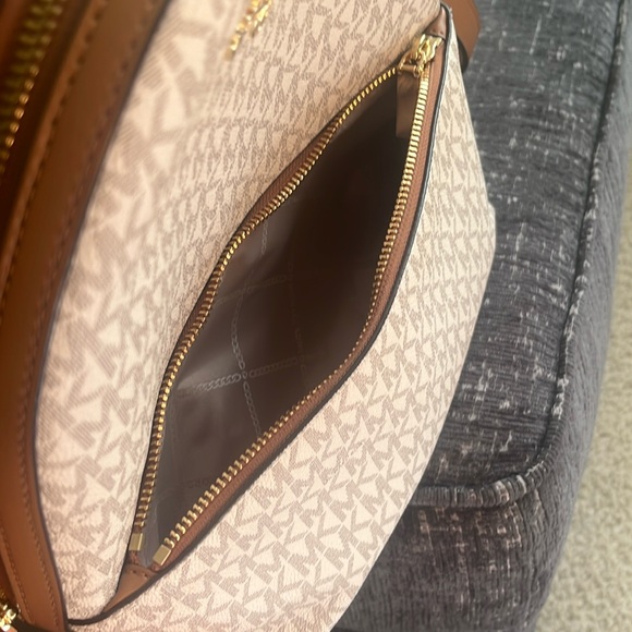Selling a Michael Kors “Sheila Medium Logo Backpack”